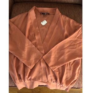 A very cute open chest top